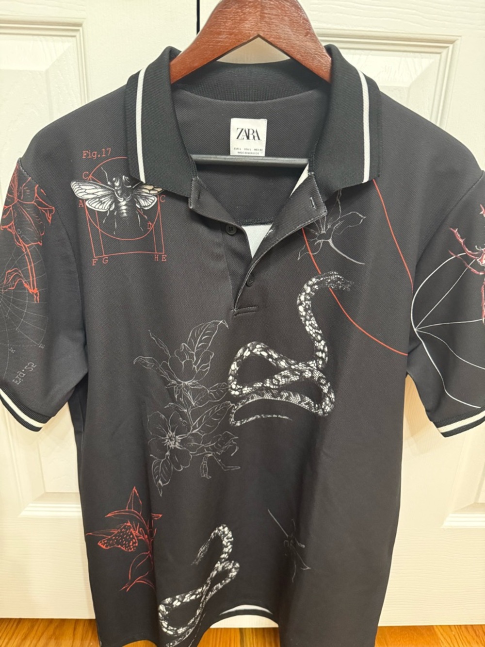 Zara Black Polo with White Snake and Red Botanical Accents